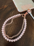 Phone wristlet - pink pearl