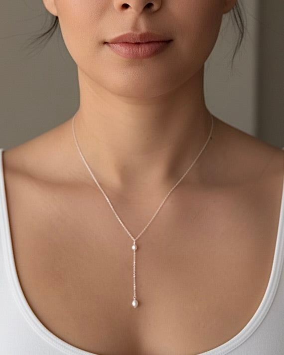 Minimal pearl Y necklace worn in gold filled or sterling silver with elegant drop pearl detail