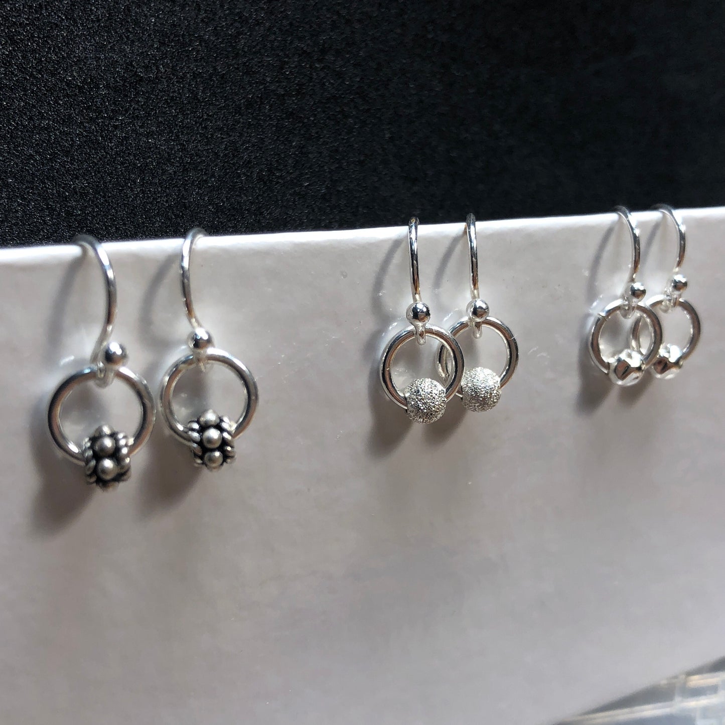 Dainty stardust silver earrings