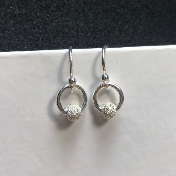 Dainty stardust silver earrings